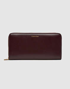 CALVIN KLEIN JEANS CK PULLER LARGE ZIP AROUND (Dimensiuni: 20 x 9cm.)
